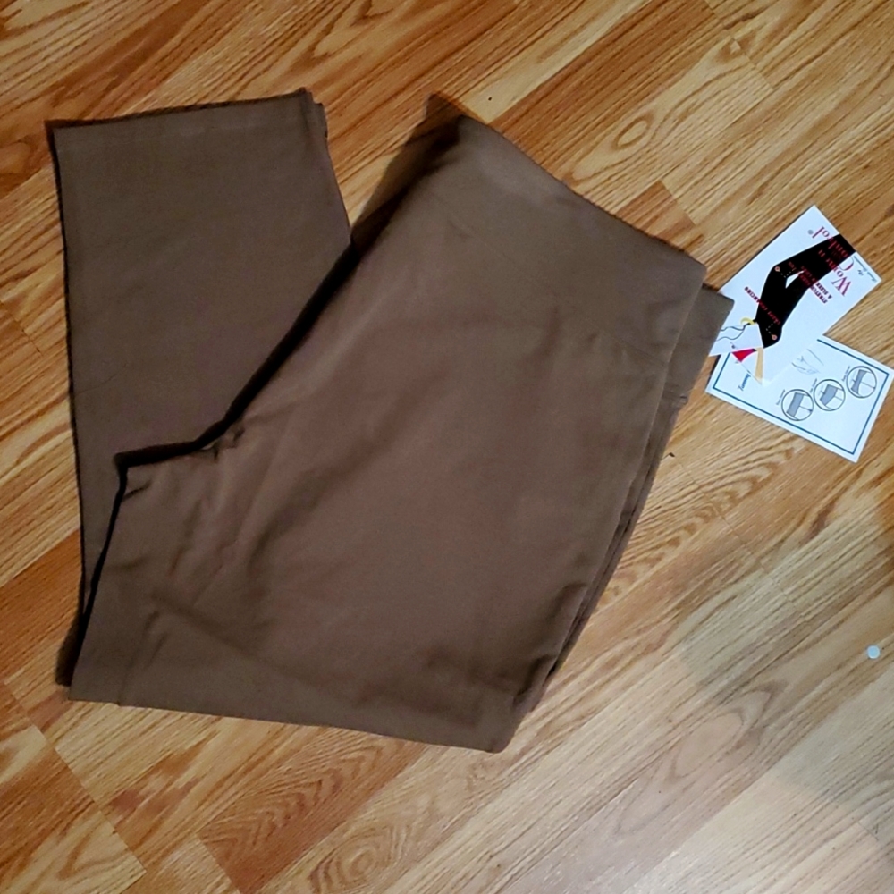 Woman with control pull on Slimming control top pants.